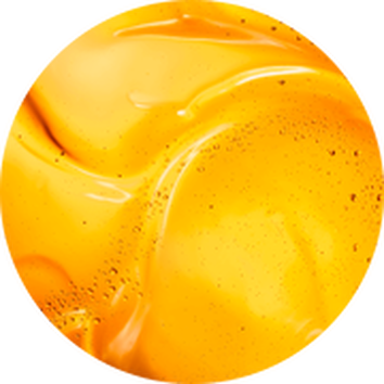 Leuchtend orangefarbener, cremiger Hersteller, der eine glatte, glanzende Textur zeigt.
