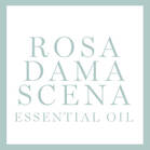 Ein großer Button mit der Aufschrift Rosa Damascena Essential Oil (Inhaltsstoff)