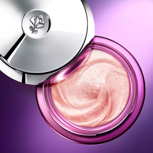 Ansicht von oben auf die geoffnete rosefarbene Renergie Multi-Glow Cream mit lilafarbenem Hintergrund