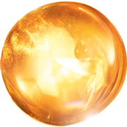 Eine leuchtende, goldene Kugel mit funkelndem innerem Licht und sanften Wellenmustern.