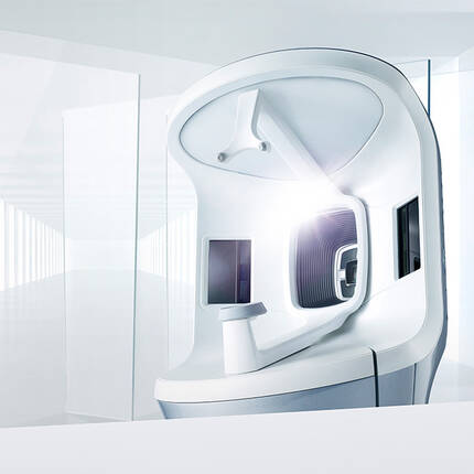 Alt-Text: Hochmodernes, minimalistisches Design eines futuristischen Gerats in einem hellen, lichtdurchfluteten Raum.