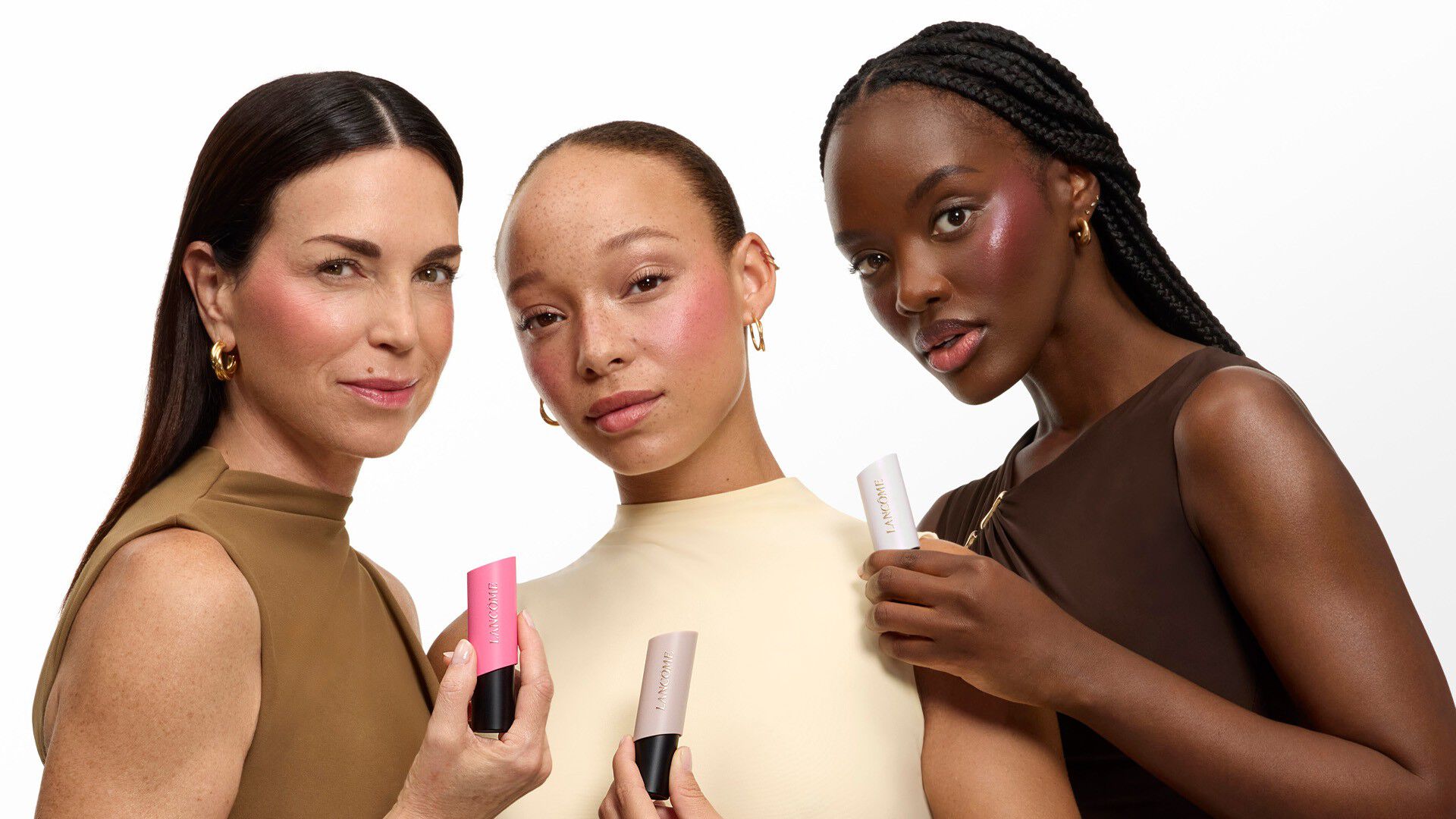 Beauty visual with 3 models wearing the Teint Idôle products